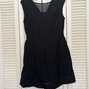 Tulle Brand Black Sleeveless Dress with fine mesh detail at neckline and hem.